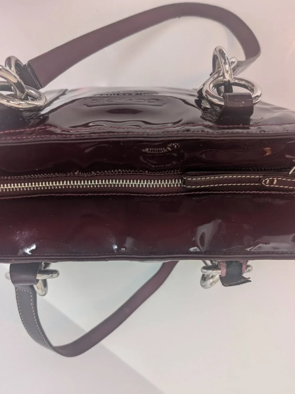 Coach Plum/Burgundy patent leather handbag